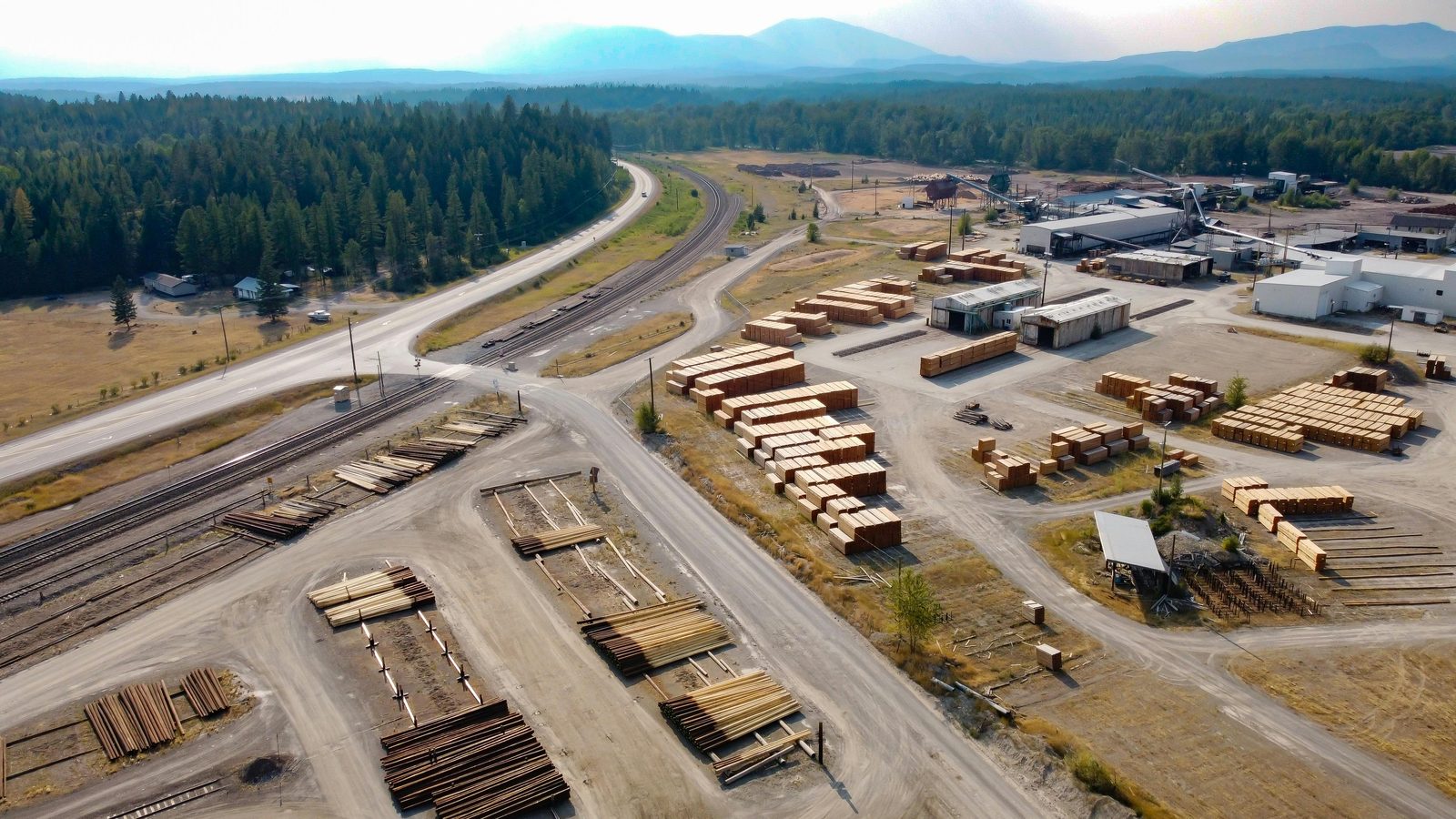 Sawmill aerial view of lumber yard with pallet supply inventory